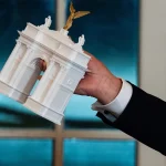 Trump’s architectural transformation of Washington raises critical questions about monumentality, political symbolism, historic context, and the role of architecture in shaping civic identity.