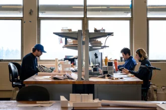 Explore why overtime has become normalized in architecture, examining studio culture, project economics, productivity, management practices, and the hidden cost of excessive working hours.