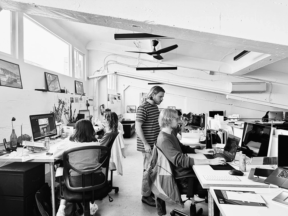 Explore why overtime has become normalized in architecture, examining studio culture, project economics, productivity, management practices, and the hidden cost of excessive working hours.