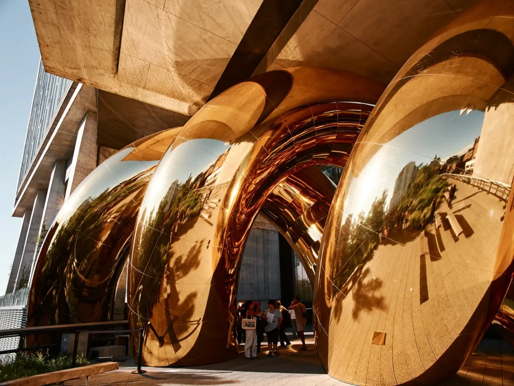 Detailed view of the inflated golden surfaces forming tight spiral curves