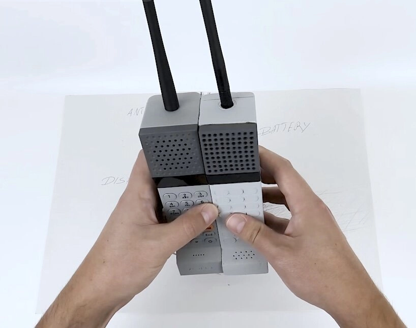 Two prototype ADHD ONE handsets held side by side, showing different grille styles and internal labeling.