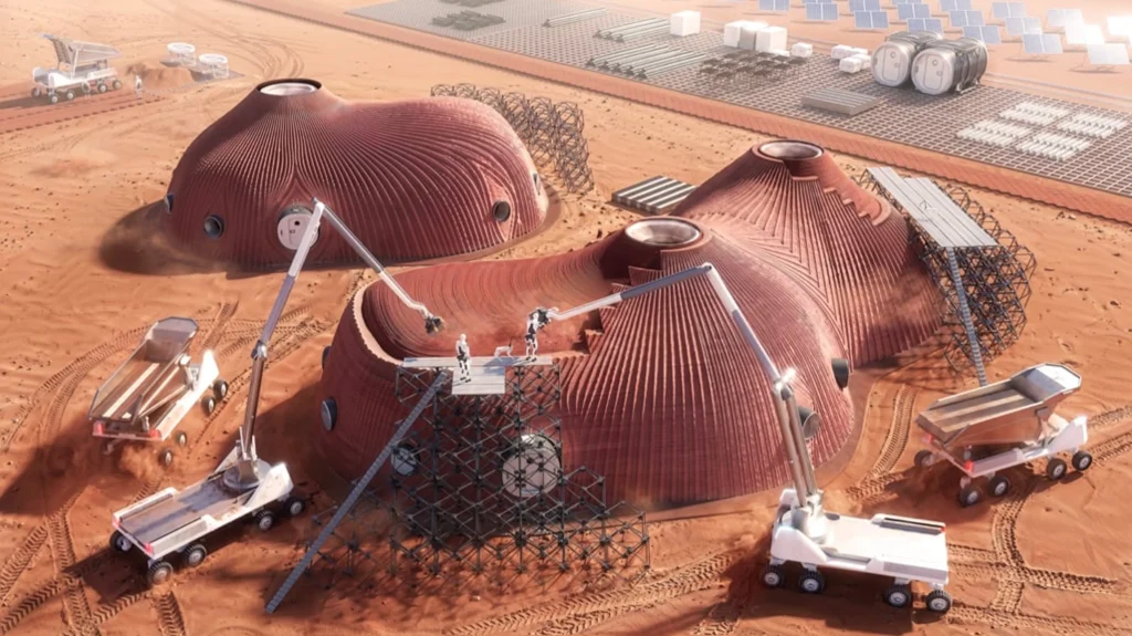Aerial rendering of large ribbed red habitat structures under construction by robotic arms and vehicles on the Martian surface, with solar arrays in the background
