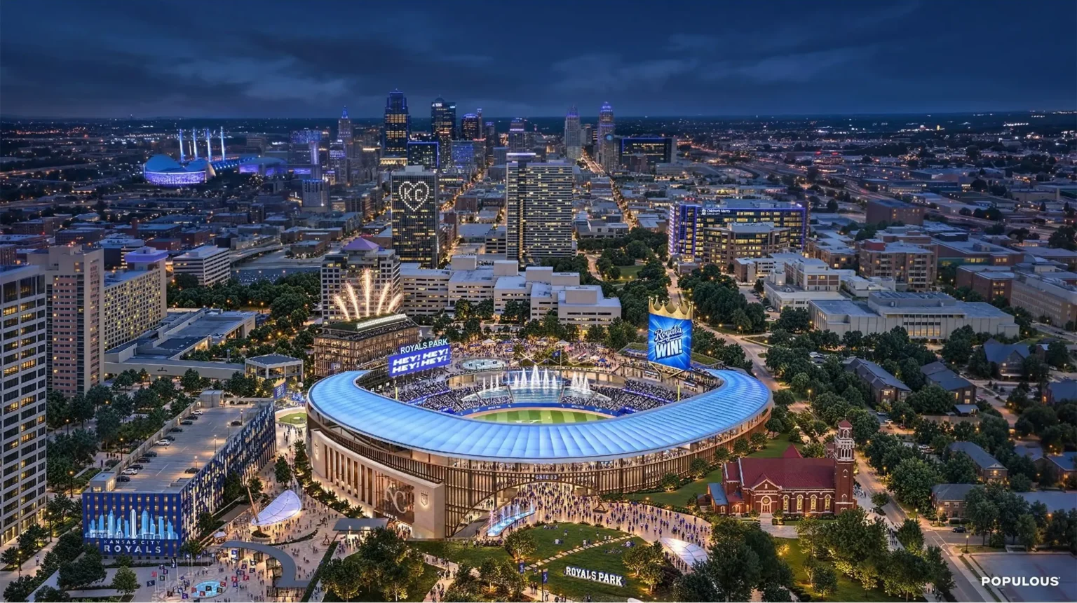 Night aerial rendering of the proposed Royals ballpark glowing blue amid the Kansas City skyline and surrounding district