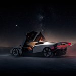 Side profile of the white Tesla Roadster on a dark reflective surface