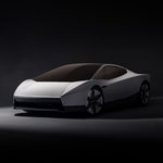 Rear view of the Roadster with thrusters firing and white vapour rising