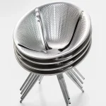 DIATOM. Aluminium stacking chair by Ross Lovegrove.
