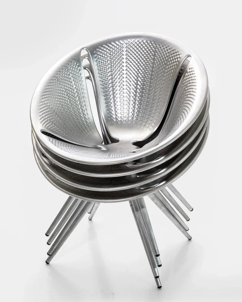 DIATOM. Aluminium stacking chair by Ross Lovegrove.