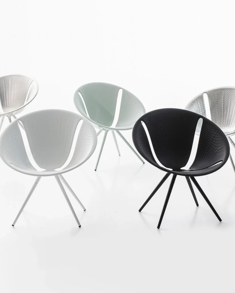 DIATOM. Aluminium stacking chair by Ross Lovegrove.