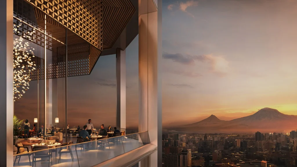 Elegant restaurant interior with floor-to-ceiling glass walls overlooking the city and Mount Ararat at sunset